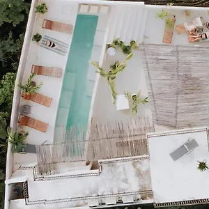 https://koos-hotel-botique-tulum.quintano-roohotels.com